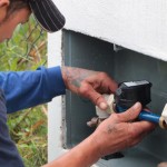 Instalação hidrômetro - Divulgação EMASA